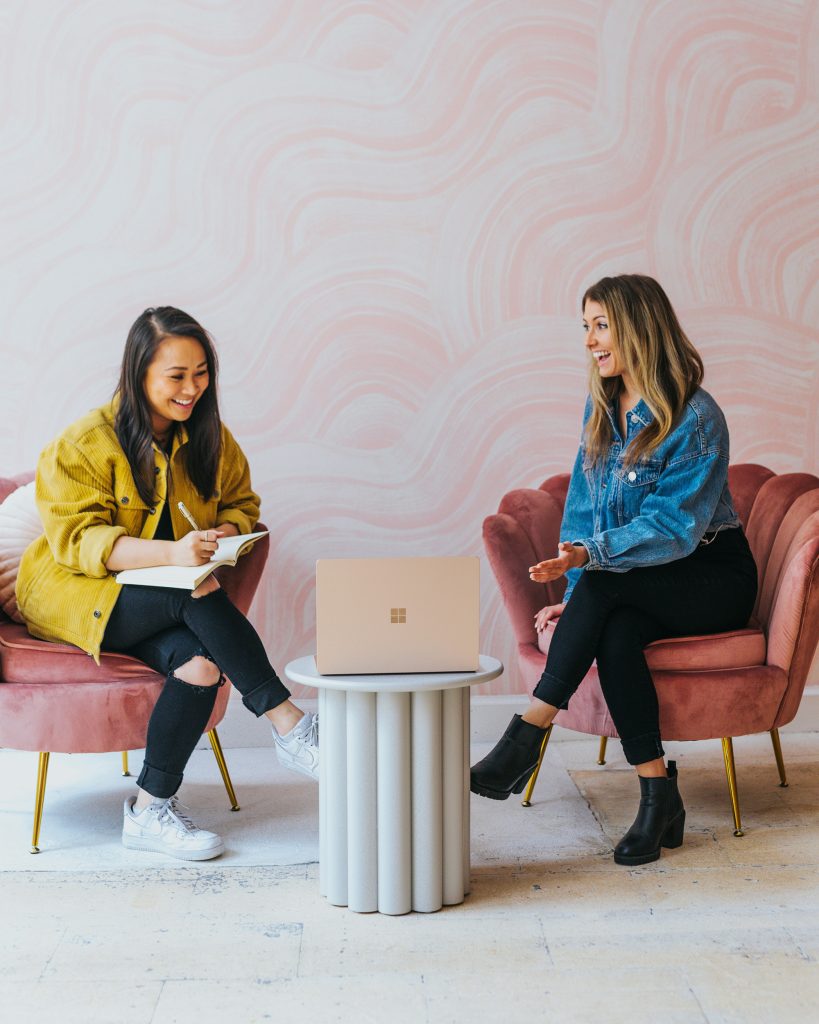 women meeting to discuss services offered